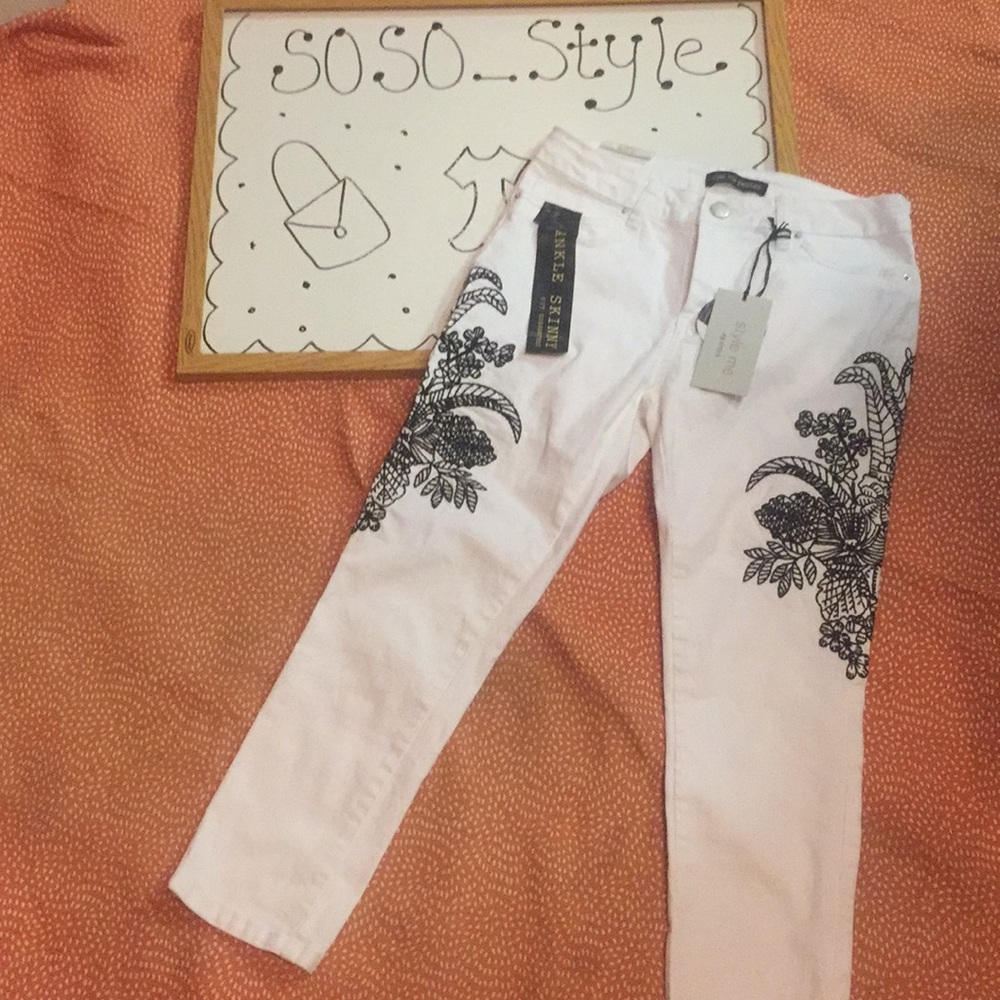 Black embroidery cropped white jeans